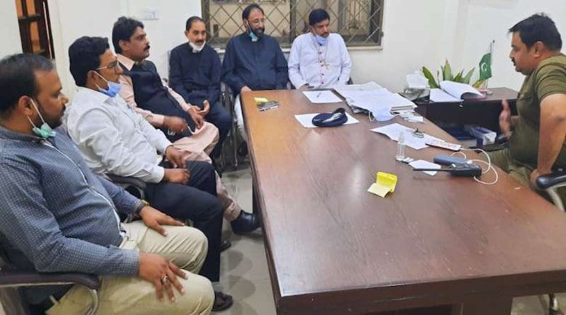 Bishop Indrias Rehmat (right) with a Catholic delegation at Civil Lines Police Station in Faisalabad on April 9. (Photo supplied)