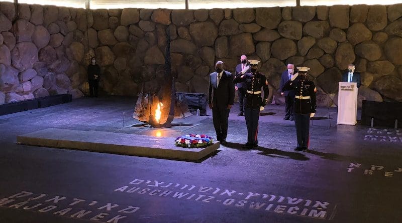 Secretary of Defense Lloyd J. Austin III stands at attention as two U.S. Marines salute after Austin placed a wreath at Yad VaShem in Jerusalem, April 12, 2021. Photo Credit: Jim Garamone, DOD