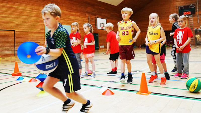 Children running a relay race as part of the Basketball Mathematics CREDIT Photographer: Allan Jørgensen, University of Copenhagen