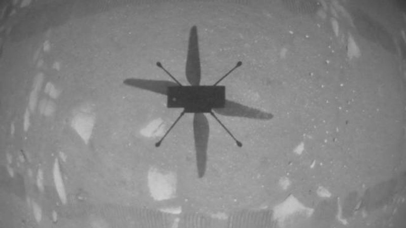 NASA's Ingenuity Mars Helicopter captured this shot as it hovered over the Martian surface on April 19, 2021, during the first instance of powered, controlled flight on another planet. It used its navigation camera, which autonomously tracks the ground during flight. Credits: NASA/JPL-Caltech