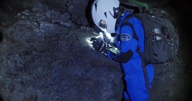 HI-SEAS crewmember exploring Mauna Loa's lava tubes as analogs for lava tubes on Mars and the moon. CREDIT HI-SEAS