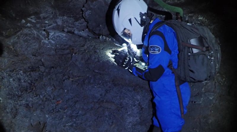 HI-SEAS crewmember exploring Mauna Loa's lava tubes as analogs for lava tubes on Mars and the moon. CREDIT HI-SEAS