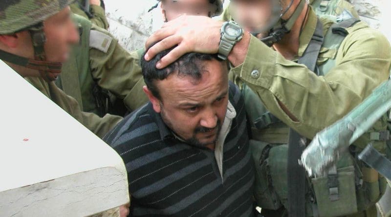 Marwan Barghouti being arrested by Israeli soldiers in Ramallah during Operation Defensive Shield. Photo Credit: IDF Spokesperson's Unit, Wikipedia Commons
