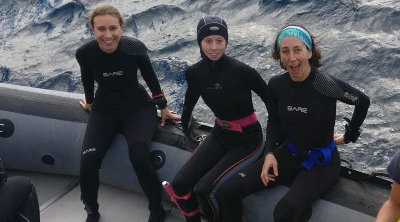 Rice University marine biologists (from left) Lauren Howe-Kerr, Amanda Shore and Adrienne Correa prepare for a research dive at the Flower Garden Banks National Marine Sanctuary in October 2018. CREDIT Photo by Carsten Grupstra/Rice University
