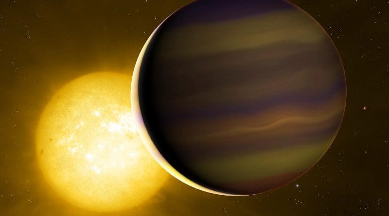 Exoplanet HD 209458b transits its star. The illuminated crescent and its colours have been exaggerated to illustrate the light spectra that the astronomers used to identify the six molecules in its atmosphere. CREDIT University of Warwick/Mark Garlick