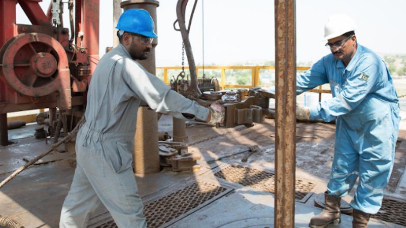 Oil workers drilling an exploration well in Pakistan. Photo Credit: OGDCL