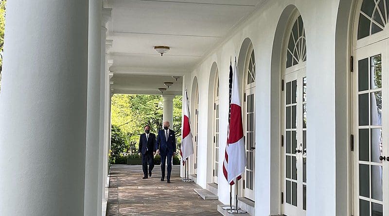 US President Joe Biden and Japanese Prime Minister Yoshihide Suga walking at the West Wing Colonnade. Photo Credit: Meghan Hays, White House, Wikipedia Commons