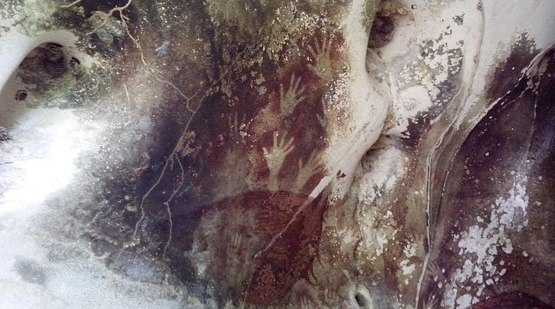 Hand prints in Pettakere Cave at Leang-Leang Prehistoric Site, Maros.. Photo Credit: Cahyo, Wikipedia Commons
