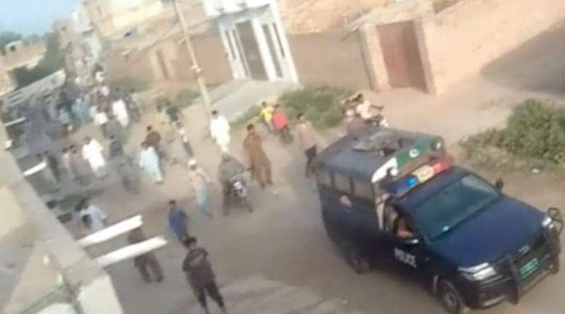 A police van patrols Chak 5 village on May 15 following a mob attack on Christian villagers. (Photo supplied)