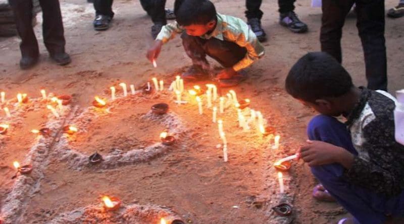 Children light candles in Mullaitivu, where thousands were killed in the final days of the 26-year Sri Lankan Civil War that ended in 2009. (Photo: UCA News)