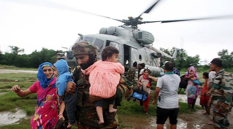 Members of India's Armed forces carry out rescue and relief during the floods in Jammu and Kashmir. Photo Credit: India Ministry of Defence, Wikipedia Commons
