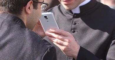 priest catholic smartphone