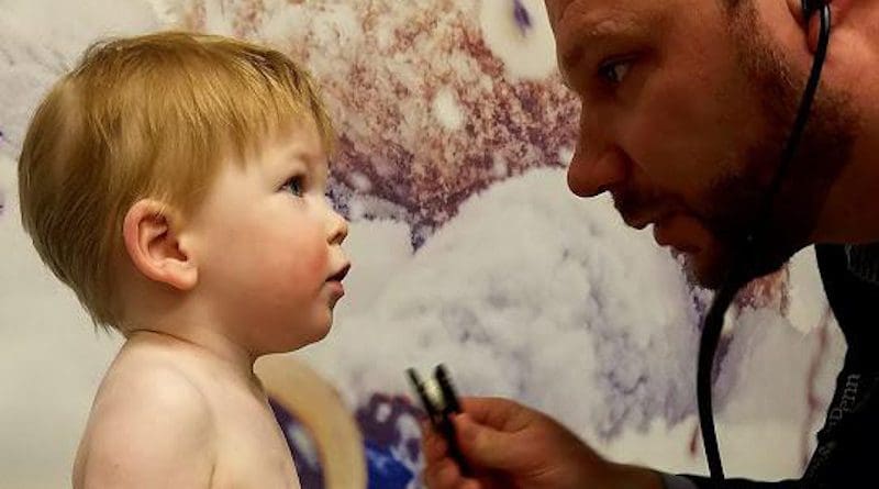 Luke at 15 months with Dr. Neil Romberg CREDIT CHOP