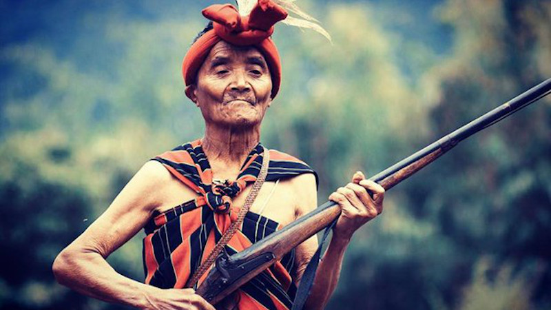 A Chin man in Myanmar holds a Tumee rifle in an undated photo. Photo Credit: Nay Lynn Photography, RFA