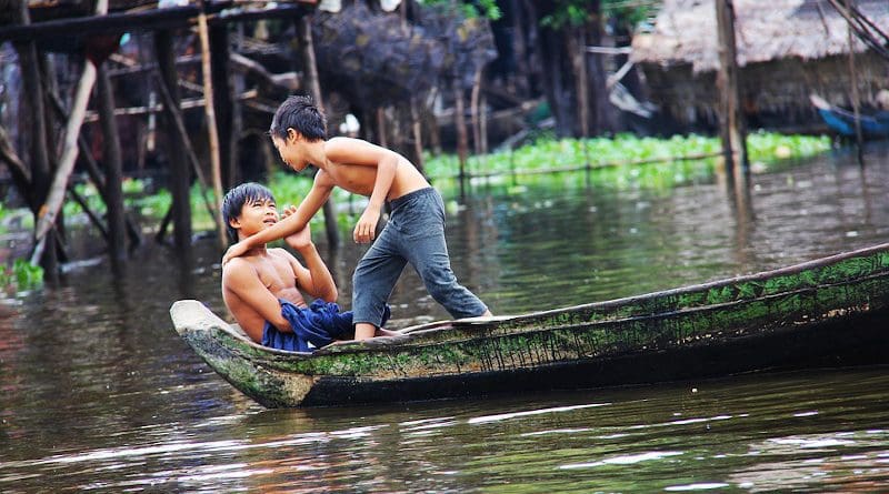cambodia asia boys children river boat