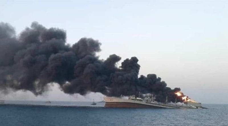 Iranian Navy's support vessel Kharg sinks off the Southern port city of Jask. Photo Credit: Fars News Agency