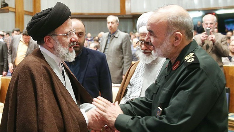 Commander of the Islamic Revolution Guards Corps Major General Hossein Salami (right) with Iran's Ebrahim Raeisi. Photo Credit: Tasnim News Agency