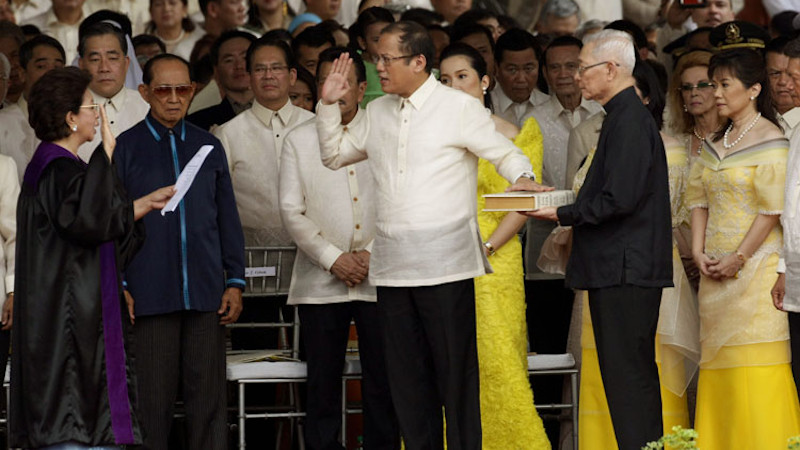 Benigno Aquino III takes the oath of office as the 15th President of the Philippines before Associate Justice Conchita Carpio-Morales at the Quirino Grandstand on June 30, 2010. Photo Credit: Rey S. Baniquet - Office of the Press Secretary, Wikipedia Commons