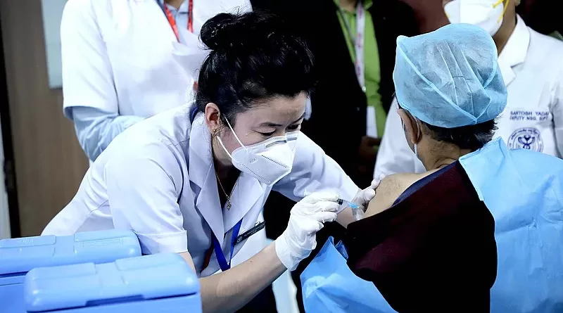 COVID-19 vaccination in New Delhi, India. Photo Credit: India Ministry of Health and Family Welfare, Wikipedia Commons