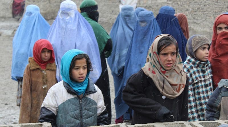 Girls and mothers, waiting for donations of heavy blankets, Kabul, 2018 Photo Credit: Dr. Hakim