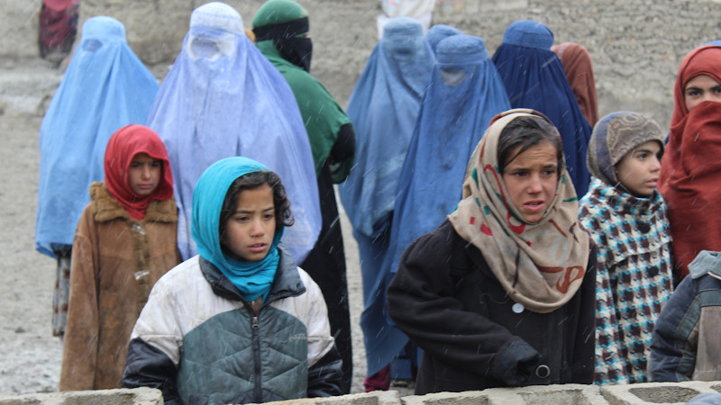 Girls and mothers, waiting for donations of heavy blankets, Kabul, 2018 Photo Credit: Dr. Hakim