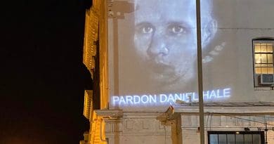 Detail of an image of Daniel Hale projected on a D.C. building on June 26, 2021. Photo credit: Nick Mottern