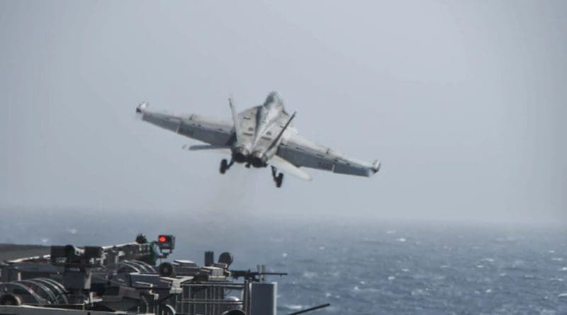 An EA-18G Growler electronic attack aircraft, attached to the “Shadowhawks” of Electronic Attack Squadron 141, launches from the flight deck of aircraft carrier USS Ronald Reagan during flight operations in the Arabian Sea, July 2, 2021. The Ronald Reagan Carrier Strike Group is deployed to the U.S. 5th Fleet area of operations in support of naval operations and providing airpower to protect U.S. and coalition forces as they conduct drawdown operations from Afghanistan. Photo Credit: Navy Seaman Oswald Felix Jr.