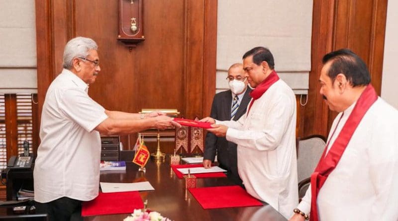 Basil Rajapaksa being sworn in as Sri Lanka's Minister of Finance by President Gotabaya Rajapaksa and in the presence of Prime Minister Mahinda Rajapaksa. Photo Credit: Office of Sri Lanka President