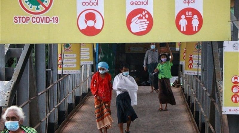 Signs in Myanmar warning people to protect themselves from coronavirus. Photo Credit: Tasnim News Agency