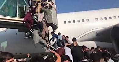 Scene at Kabul airport as civilians seek to board plane to evacuate Afghanistan. Photo Credit: Screenshot of Mehr News Agency video