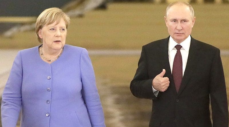 Russia's President Vladimir Putin with Federal Chancellor of Germany Angela Merkel before a joint news conference. Photo: Kremlin.ru/TASS