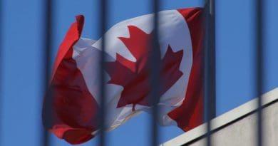 Flags of China and Canada. Photo Credit: Fars News Agency
