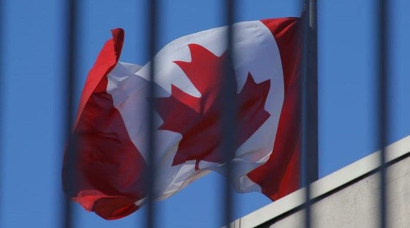 Flags of China and Canada. Photo Credit: Fars News Agency