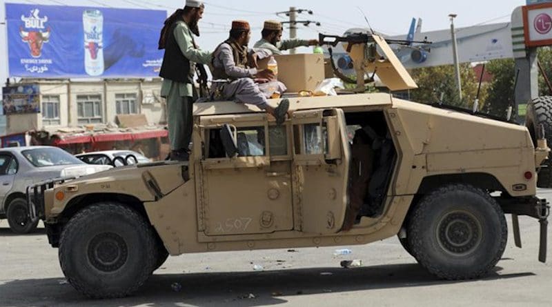 Taliban in Afghanistan driving a seized US military Humvee. Photo Credit: Fars News Agency