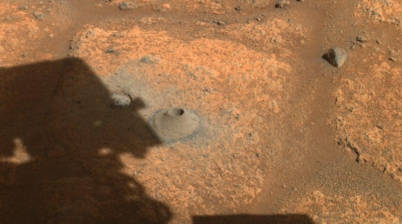 This image taken by one the hazard cameras aboard NASA's Perseverance rover on Aug. 6, 2021, shows the hole drilled in what the rover's science team calls a "paver rock" in preparation for the mission's first attempt to collect a sample from Mars. Credits: NASA/JPL-Caltech