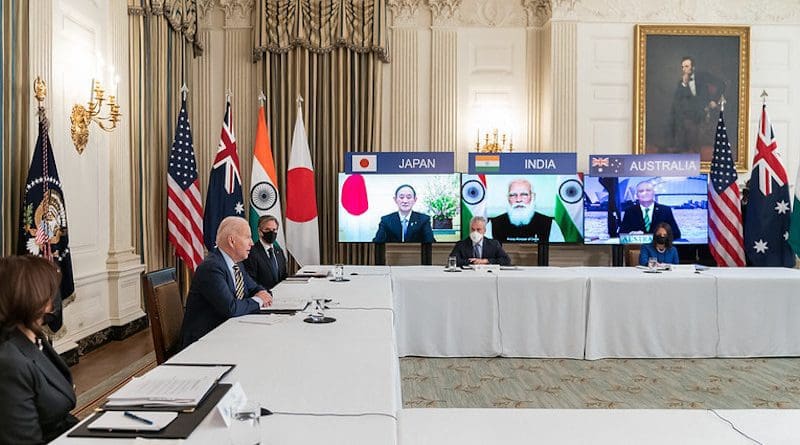 President Joe Biden, joined by Vice President Kamala Harris, Secretary of State Antony Blinken and White House staff, participates in the virtual Quad Summit with Australia, India, and Japan Friday, March 12, 2021, in the State Dining Room of the White House. (Official White House Photo by Adam Schultz)