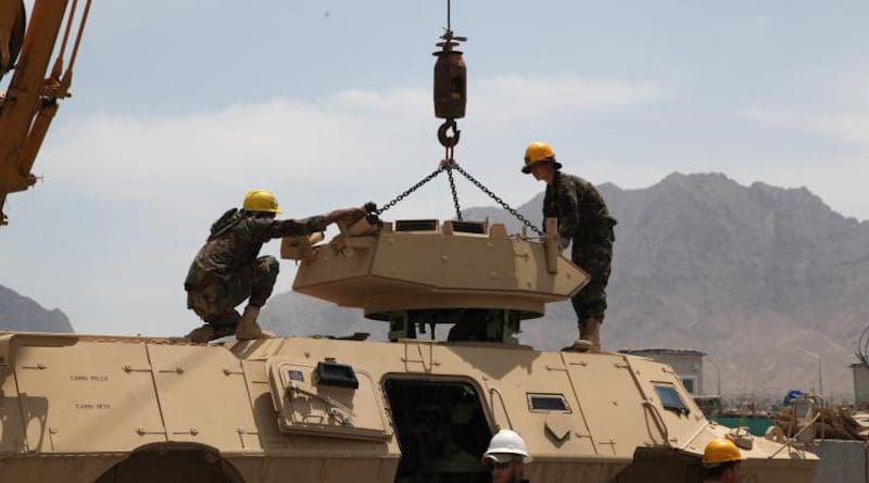 Afghan National Army (ANA) students remove the turret on a US-supplied ASV-150/M-1117 armoured vehicle as part of maintenance training, 2013. Photo: Wikimedia Commons/SGT Kent Redmond