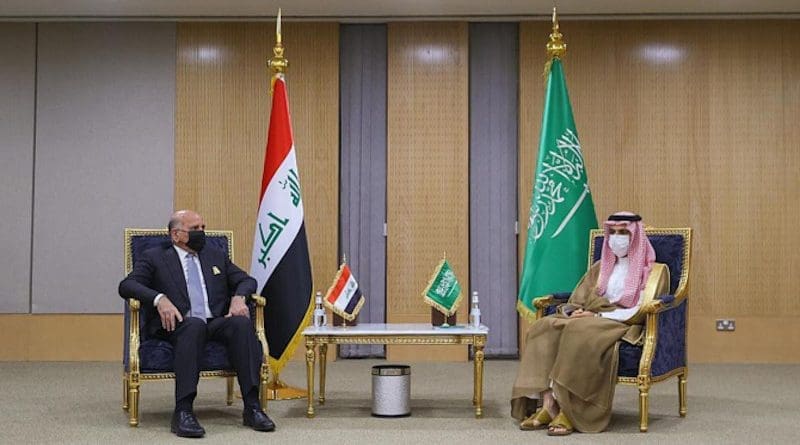 Saudi Arabia's Prince Faisal bin Farhan (right) and Iraq's Fuad Hussein. Photo Credit: SPA