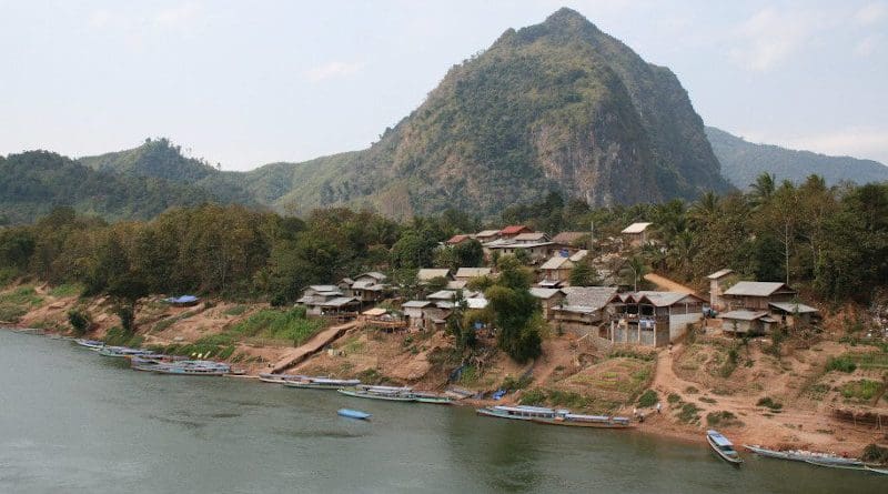 A community by the river in Laos. A new study reports that the increase in scrub and murine typhus cases in the country is linked to changing climate. Copyright: Terry Sunderland/CIFOR, (CC BY-NC-ND 2.0). This image has been cropped.