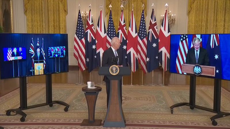 US President Joe Biden with Australia's Prime Minister Scott Morrison (left) and UK Prime Minister Boris Johnson. Photo Credit: White House video screenshot