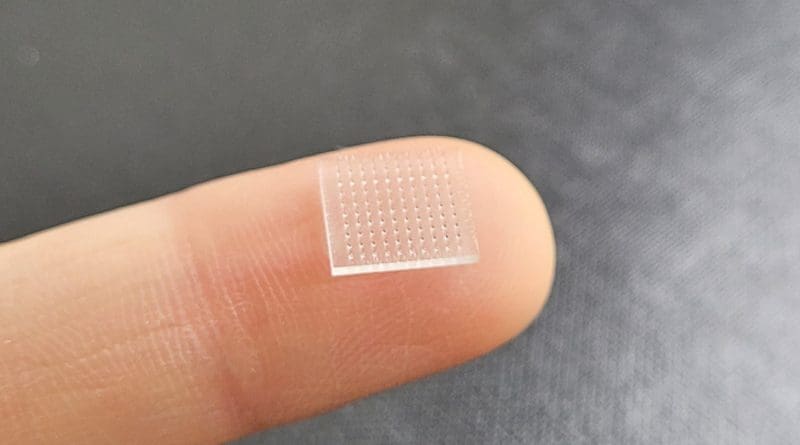 Scientists at the University of North Carolina at Chapel Hill and Stanford University use 3D printer to produce microneedle vaccine patch that dissolves into the skin to boost immunity. CREDIT: University of North Carolina at Chapel Hill