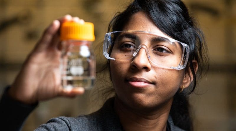 Just as important as understanding how best to capture CO2 is understanding how to use it. A new study details how CO2 can be converted into methane, the primary component of synthetic natural gas. Here, Jotheeswari Kothandaraman, PNNL chemist and author of the new study, holds a sample of methanol, which has an even greater number of applications than methane. CREDIT: (Photo by Andrea Starr | Pacific Northwest National Laboratory)