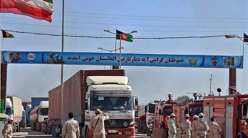 Trucks pass through border between Iran and Afghanistan. Photo Credit: Tasnim News Agency