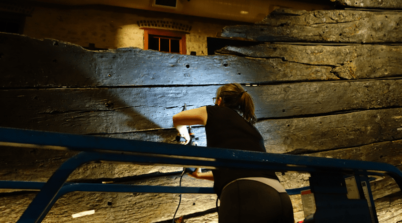 Aoife Daly extracting a tree-ring sample from the Batavia ship’s hull planking in strake 14 CREDIT: (Photo: W. van Duivenvoorde).