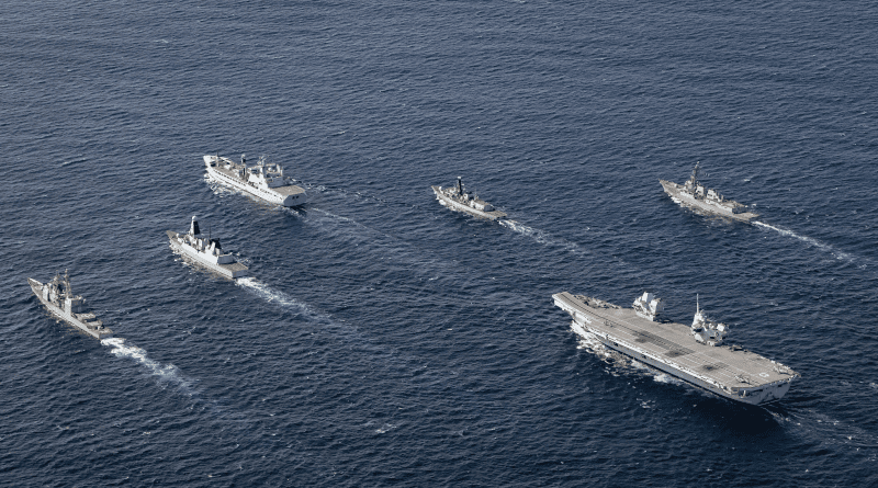 HMS Queen Elizabeth in formation with her Carrier Strike Group. Photo Credit: UK MOD