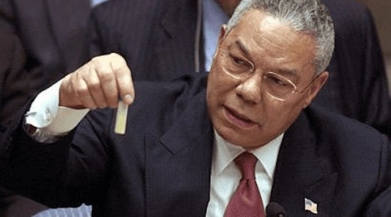 Colin Powell holding a model vial of anthrax while giving a presentation to the United Nations Security Council in February 2003. Photo Credit: United States Government, Wikipedia Commons
