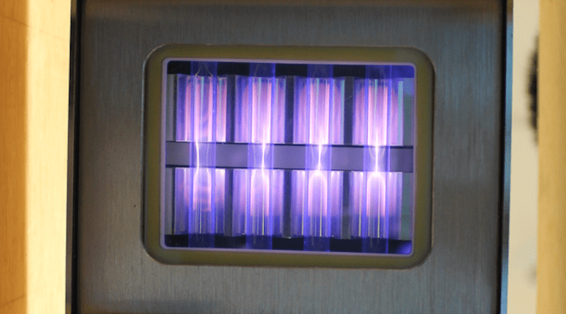 UV light being emitted by a krypton chloride excimer lamp, fueled by molecules moving between different states of energy. CREDIT: Linden Research Group / CU Boulder