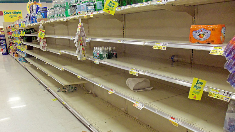 Empty supermarket shelves. Photo Credit: Daniel Case, Wikipedia Commons