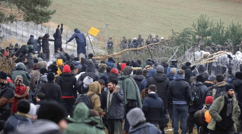 Migrants attempting to cross the border between Poland and Belarus. Photo Credit: Tasnim News Agency