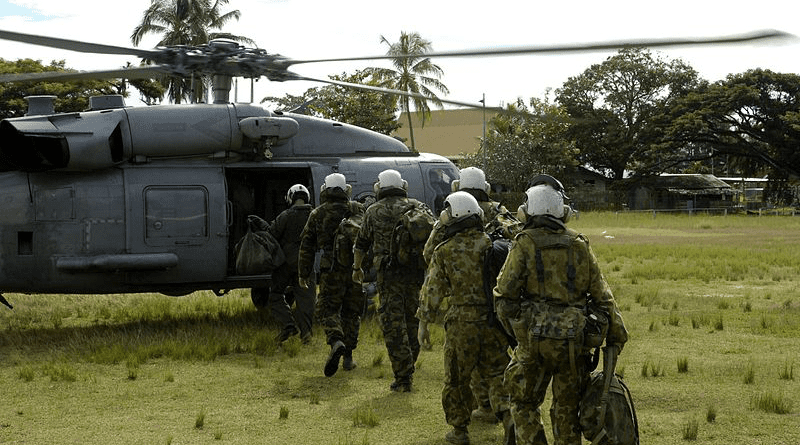 File photo of U.S., New Zealand and Australian service members board a helicopter in the Solomon Islands. Photo Credit: Mass Communication Specialist 2nd Class (SW/AW) Andrew Meyers.